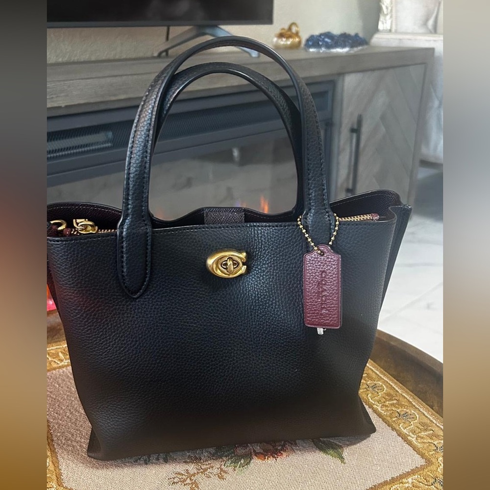 Black Leather Handbag with Gold Accents